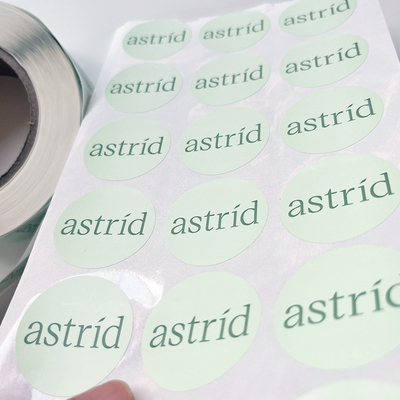 Gli autoadesivi rotondi di stampa adesivi dell'etichetta di immagine su ordinazione del testo impermeabilizzano il rotolo dell'autoadesivo del vinile
